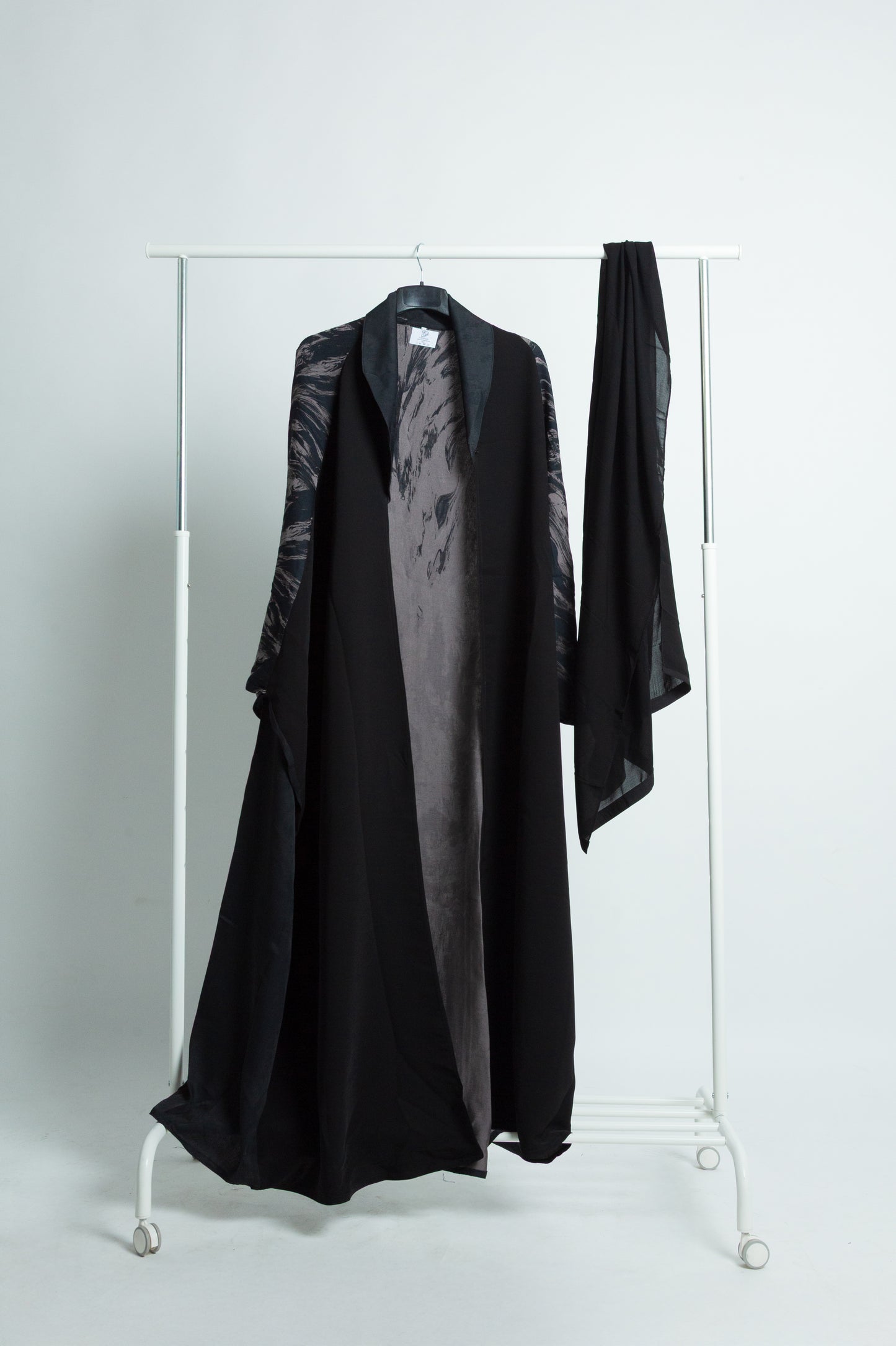 The Royal Meshlah Abaya... Coat-Inspired Elegance with a Marble Touch