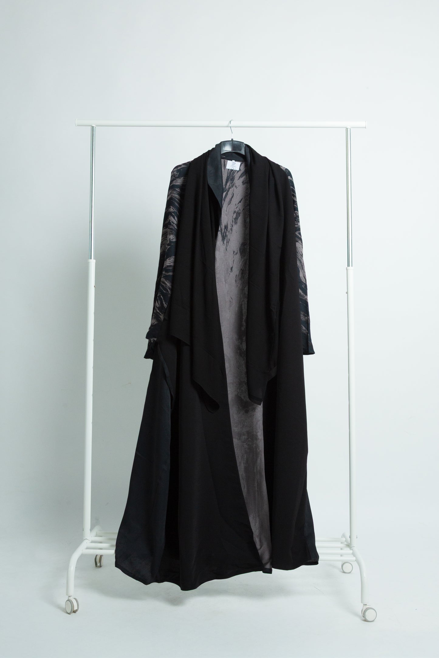 The Royal Meshlah Abaya... Coat-Inspired Elegance with a Marble Touch